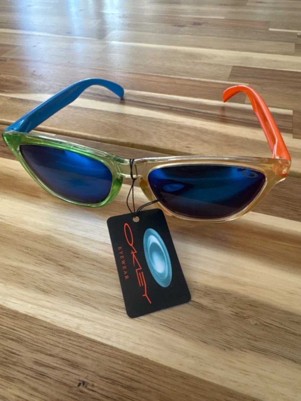 2 Oakley style kids Sunglasses polarized lenses. Not sure if authentic NWT